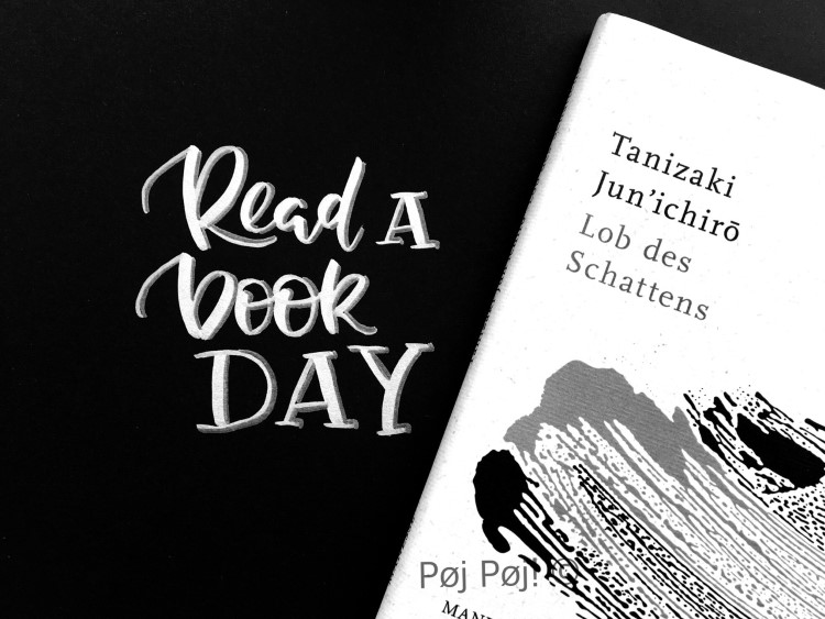 Handlettering - weiss auf schwarz - read a book a day