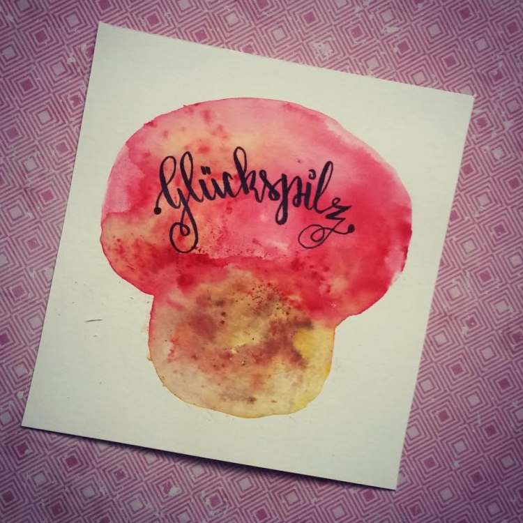 Glückspilz - Handlettering mit gemaltem Pilz